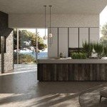 Cuisine italienne haut de gamme avec îlot central en bois et grand espace de rangement à Montpellier