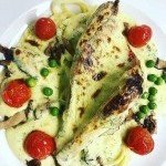 Suprême de volaille fermière préparé par le chef du Coq Rouge à Saint-Genis-Pouilly