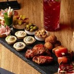 Planche apéritive de bouchées à partager au bar dinatoire Le Galta, snacking convivial