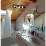 Salle de bains avant travaux avec double vasque et plafond en bois, projet de rénovation intérieure à Annemasse avec Liberté Patrimoine Rénovation