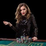 Croupière en pleine partie de jeu au Casino de Saint-Julien