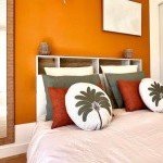 Chambre décorée avec soin aux tons terracotta, service de home staging par GoldenKeys, conciergerie à Cluses