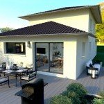 Maison neuve avec grande terrasse extérieure et espace repas réalisée par Maisons des 2 Savoie