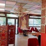 Salle décorée dans un style traditionnel indien au restaurant Indian Masala Saint-Julien-en-Genevois