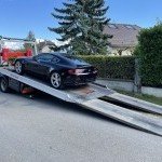 Transport sécurisé d’un véhicule haut de gamme sur un plateau DVRA