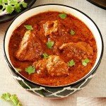 Curry d’agneau mijoté aux épices, plat traditionnel indien au restaurant Indian Masala Douvaine