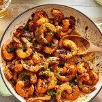 Curry de crevettes au lait de coco et épices douces, spécialité indienne à Douvaine