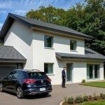 Maison familiale avec garage et jardin dans un projet de construction de maison individuelle en Savoie