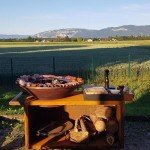 Barbecue Ofyr en extérieur pour cuisson au feu de bois à La Fromagerie à Viry