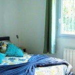 Chambre parentale décorée avec soin, appartement en location à Béziers 34