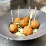 Mini-malakoffs suisses servis en portion individuelle au restaurant Le Gaium